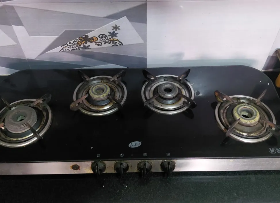 Glen 4 Burner Black Color Glass top Gas Stove Repair Service